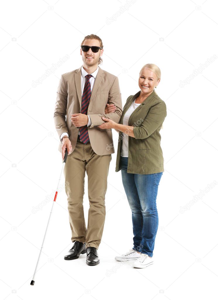 Blind young man with mother on white background