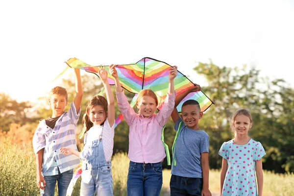 Little children flying kite outdoors — Stock Photo, Image