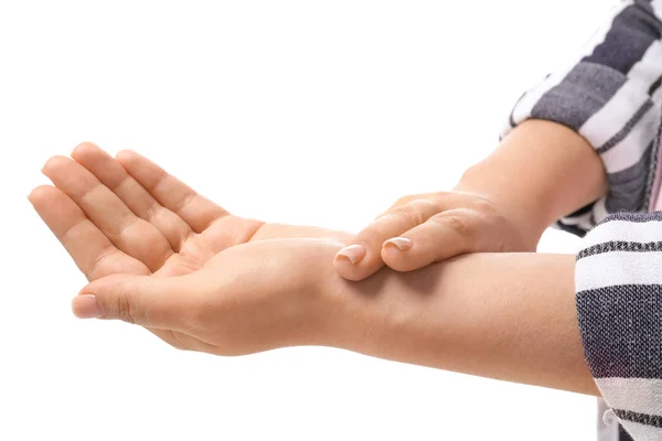 Woman checking her pulse on white background — Stock Photo, Image