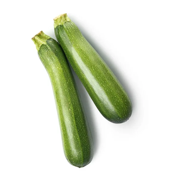 Courges fraîches courgettes sur fond blanc — Photo