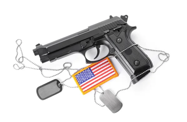 Gun, dog tags and chevron of USA army on white background — Stock Photo, Image