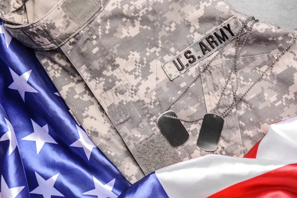 Military uniform and USA flag, top view — Stock Photo, Image