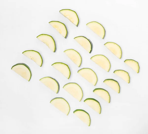 Slices of fresh zucchini on white background — Stock Photo, Image