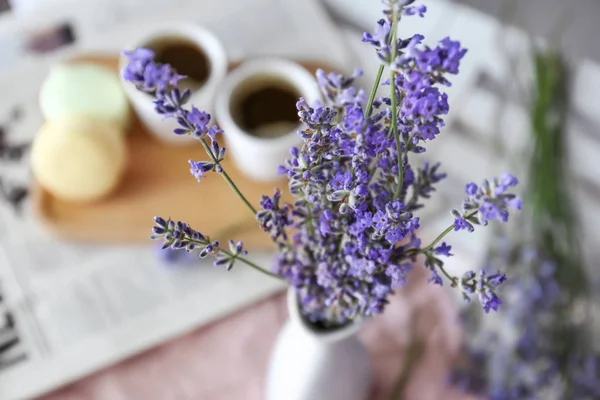 Beautiful lavender flowers in vase on table, closeup — Stock Photo, Image