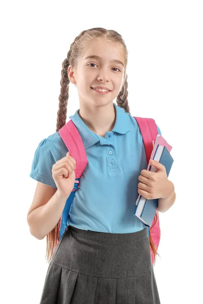 Schattig klein schoolmeisje op witte achtergrond — Stockfoto