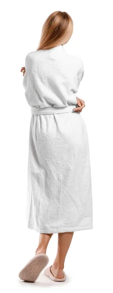 Beautiful young woman in bathrobe on white background, back view — Stock Photo, Image