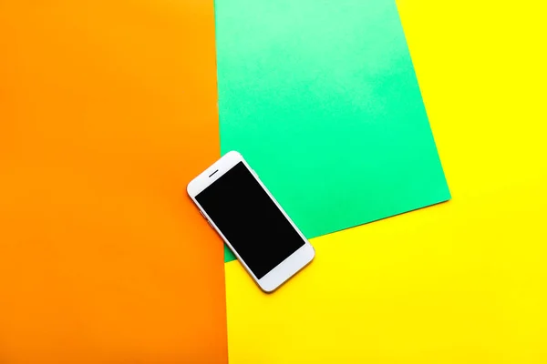 Modern mobile phone on color background — Stock Photo, Image