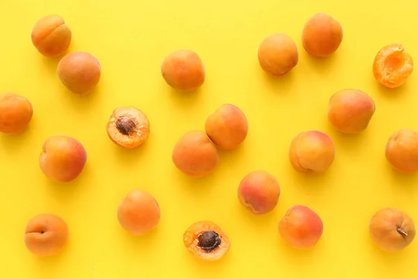 Tasty apricots on color background — Stock Photo, Image