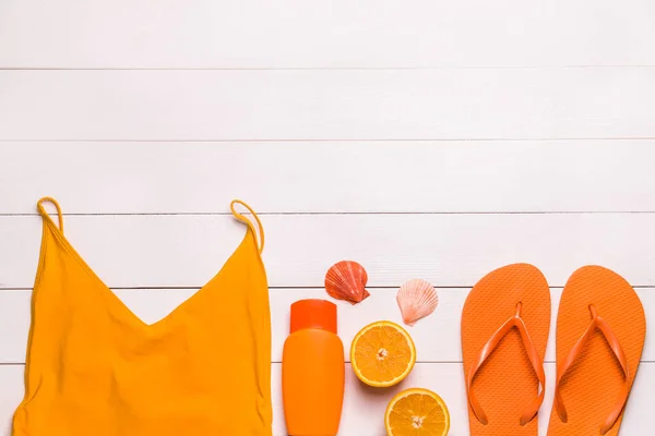 Composition with beach accessories on wooden background — Stock Photo, Image