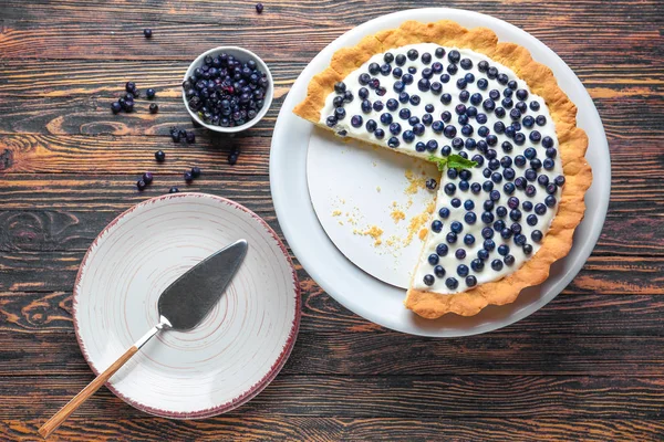 Composition with tasty bilberry pie on table — Stock Photo, Image