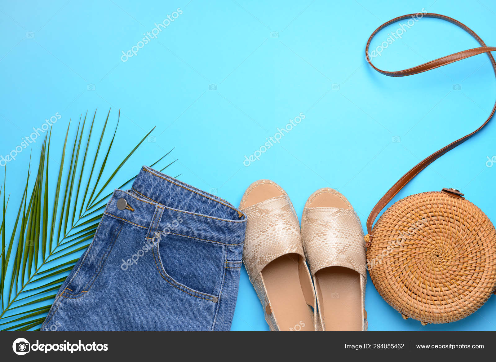 Clothes, shoes and bag on color background Stock Photo by ©serezniy