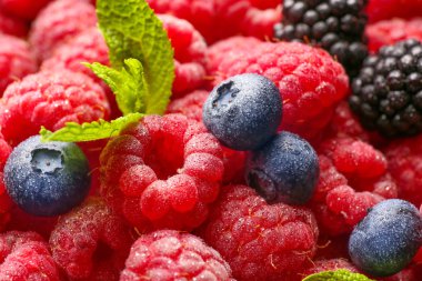 Arka plan olarak birçok tatlı olgun meyveleri