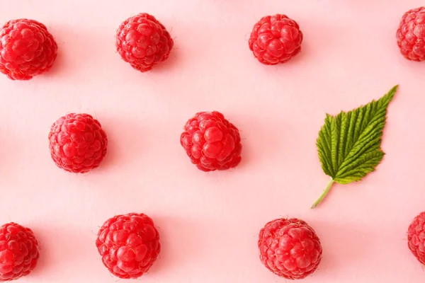 Sweet ripe raspberry on color background