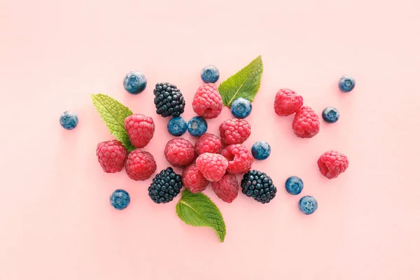 Sweet ripe berries on color background — Stock Photo, Image