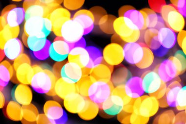 Koyu arkaplanda bulanık ışıklar