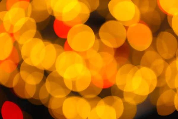 Luces borrosas sobre fondo oscuro — Foto de Stock