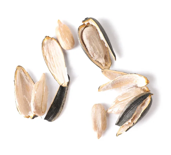 Sunflower shell and seeds on white background — Stock Photo, Image