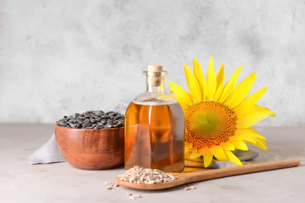 Composition with sunflower oil on table — Stock Photo, Image