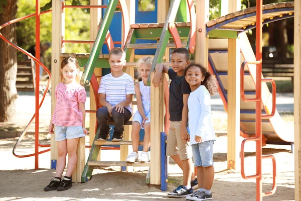 Cute little children on playground outdoors — Stock Photo, Image