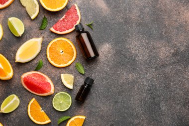 Grunge arka plan üzerinde narenciye uçucu yağ ile Kompozisyon