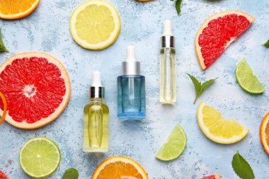 Renk arka planda narenciye uçucu yağ ile Kompozisyon