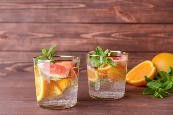 Glasses of fresh infused water on table — Stock Photo, Image