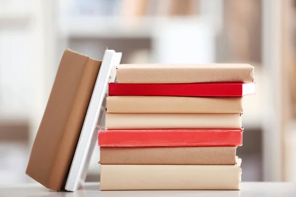 Many different books on table