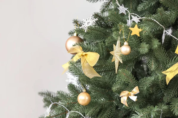 Beautiful decorated Christmas tree in room, closeup — Stock Photo, Image