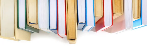 Many books on white background — Stock Photo, Image