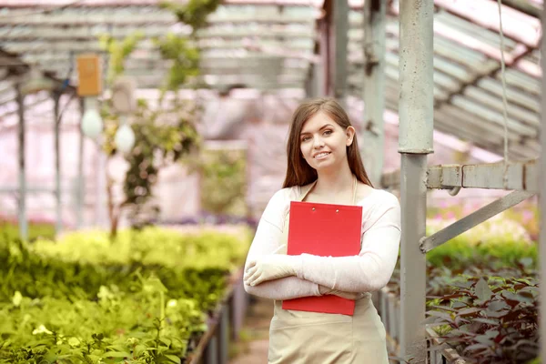 Portrait of female agricultural engineer in greenhouse — Stock Photo, Image