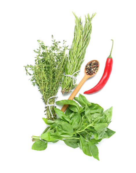 Different fresh herbs and spices on white background