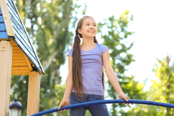 Cute little girl on playground — Stock Photo, Image