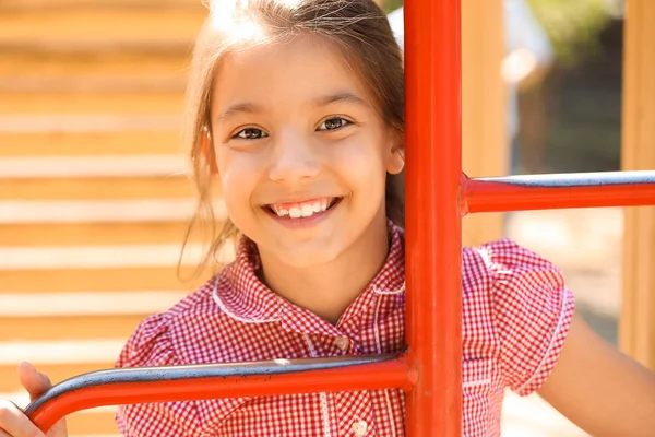 Cute little girl on playground — Stock Photo, Image