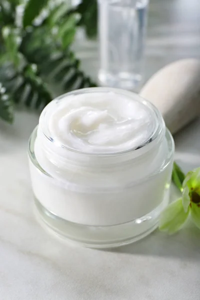 Jar of body cream on white table — Stock Photo, Image