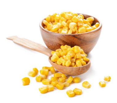 Kase ve Mısır taneleri beyaz zemin üzerine kaşıkla