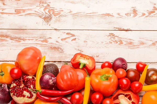 Assortment of fresh vegetables on white wooden background — Stock Photo, Image