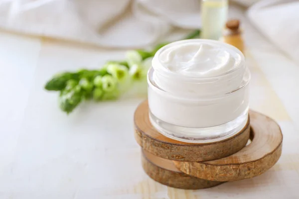 Jar of natural cream on light background — Stock Photo, Image