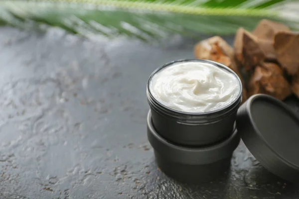 Jar of natural cream on dark background — Stock Photo, Image