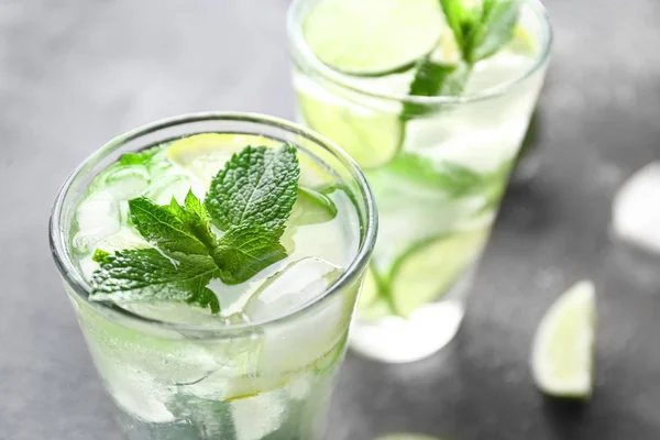 Glasses of fresh mojito on table, closeup — Stock Photo, Image