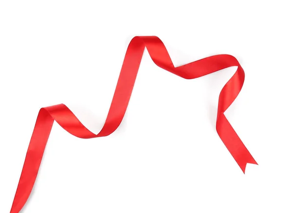 Fita de cetim vermelho no fundo branco — Fotografia de Stock