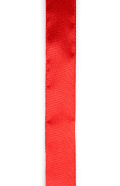 Красная атласная лента на белом фоне — стоковое фото