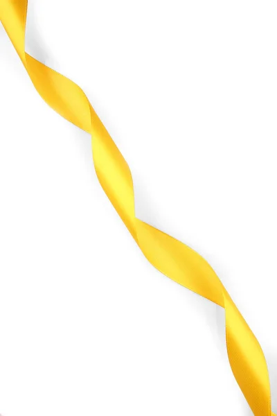 Yellow satin ribbon on white background — Stock Photo, Image