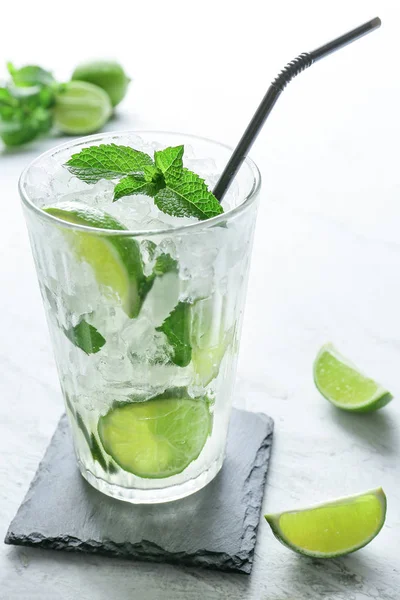 Glass of fresh mojito on table — Stock Photo, Image