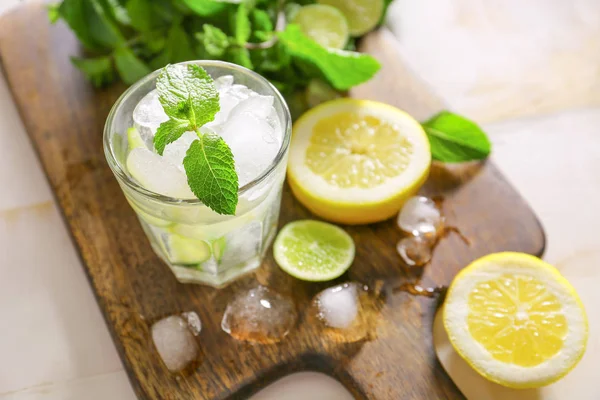 Glass of fresh mojito on wooden board — Stock Photo, Image