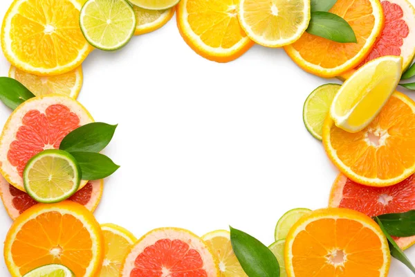 Frame made of different citrus fruits on white background — Stock Photo, Image