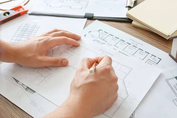 Architect working on project of building in office, closeup — Stock Photo, Image
