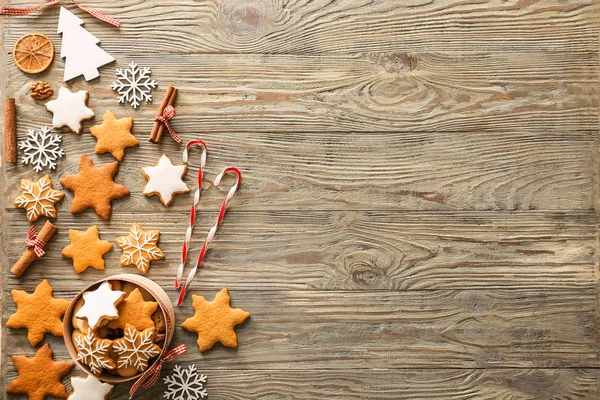 Composition with tasty Christmas cookies on wooden background — Stock Photo, Image