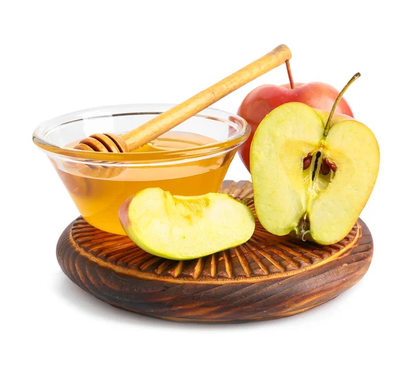 Tigela de mel fresco e maçãs sobre fundo branco — Fotografia de Stock
