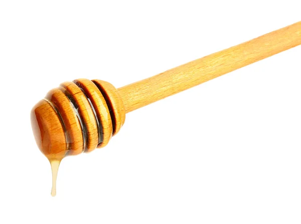 Κουτάλα ξύλινη μέλι σε άσπρο φόντο — Φωτογραφία Αρχείου