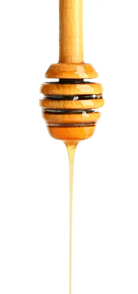 Wooden honey dipper on white background — Stock Photo, Image